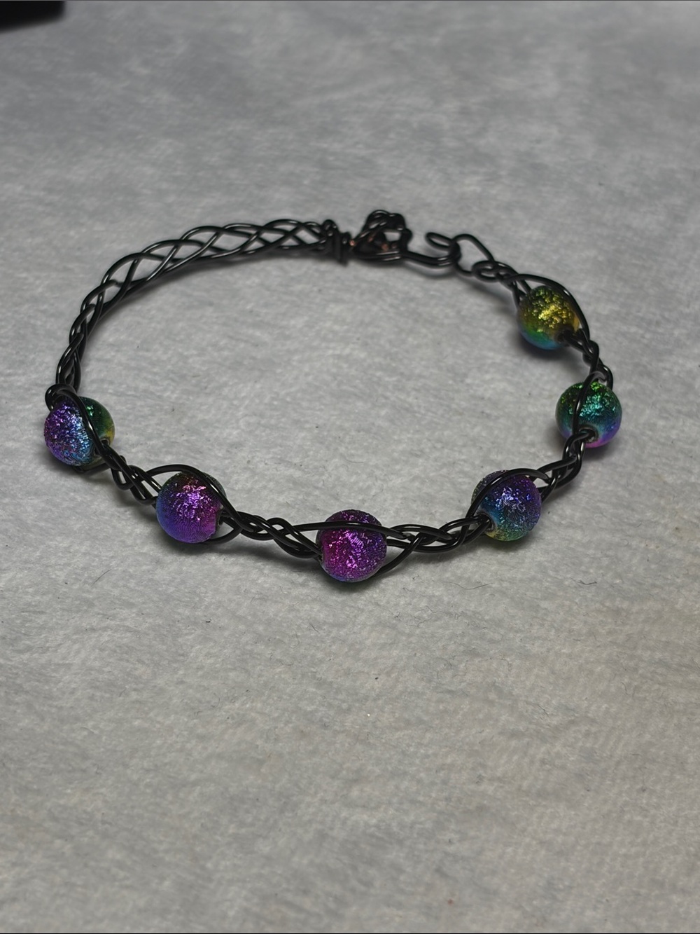 Handmade Iridescent Glass Bead Black Wire Bracelet - Purple & Green